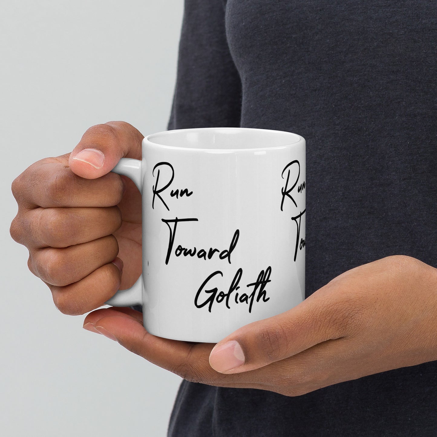 Run Toward Goliath White glossy mug